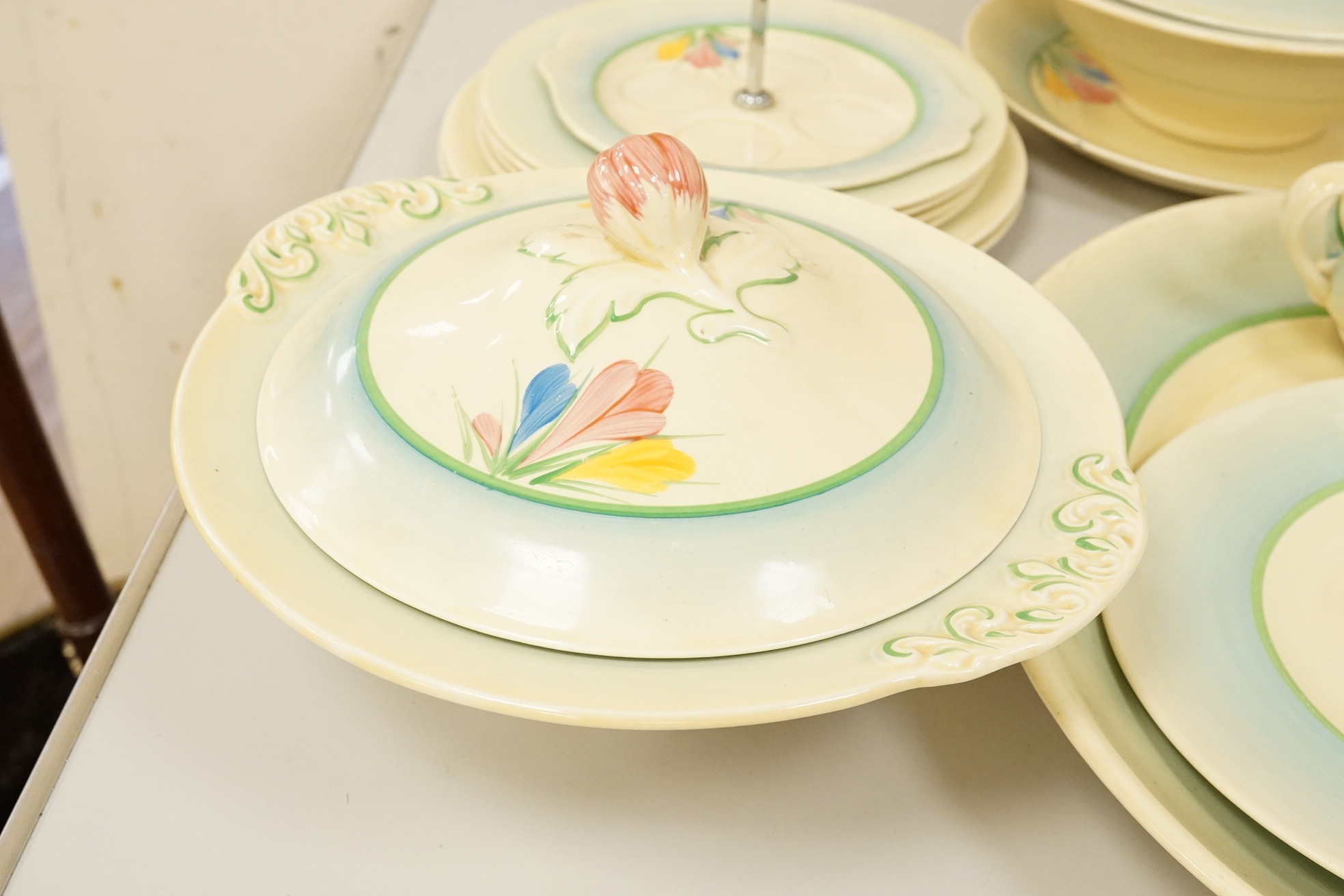 A collection of Clarice Cliff, Newport Pottery and Spring Crocus pattern tableware